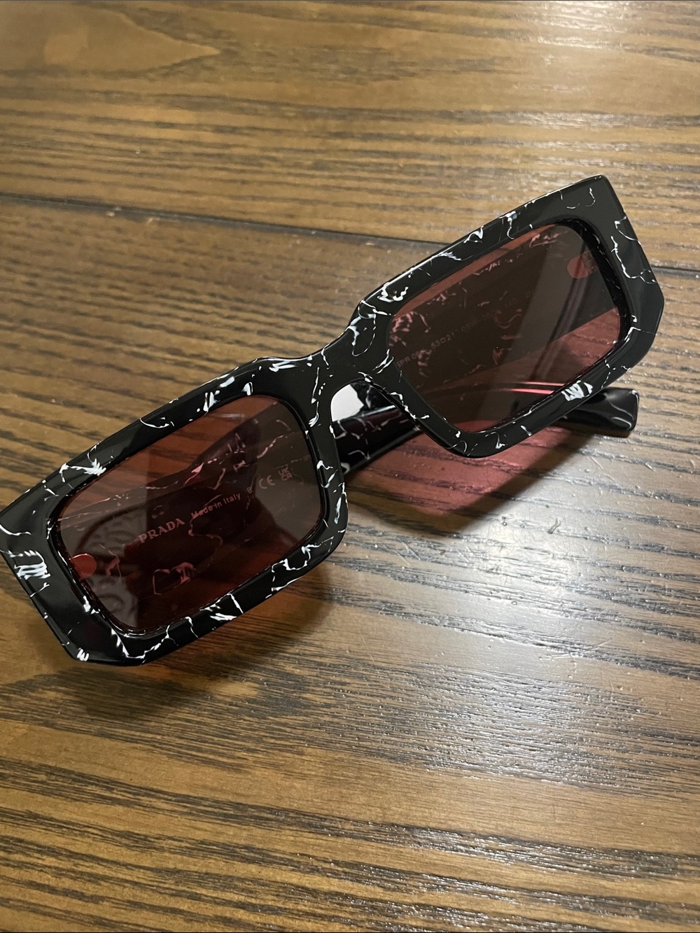 Prada Black Marble Acetate Sunglasses with Red Lenses